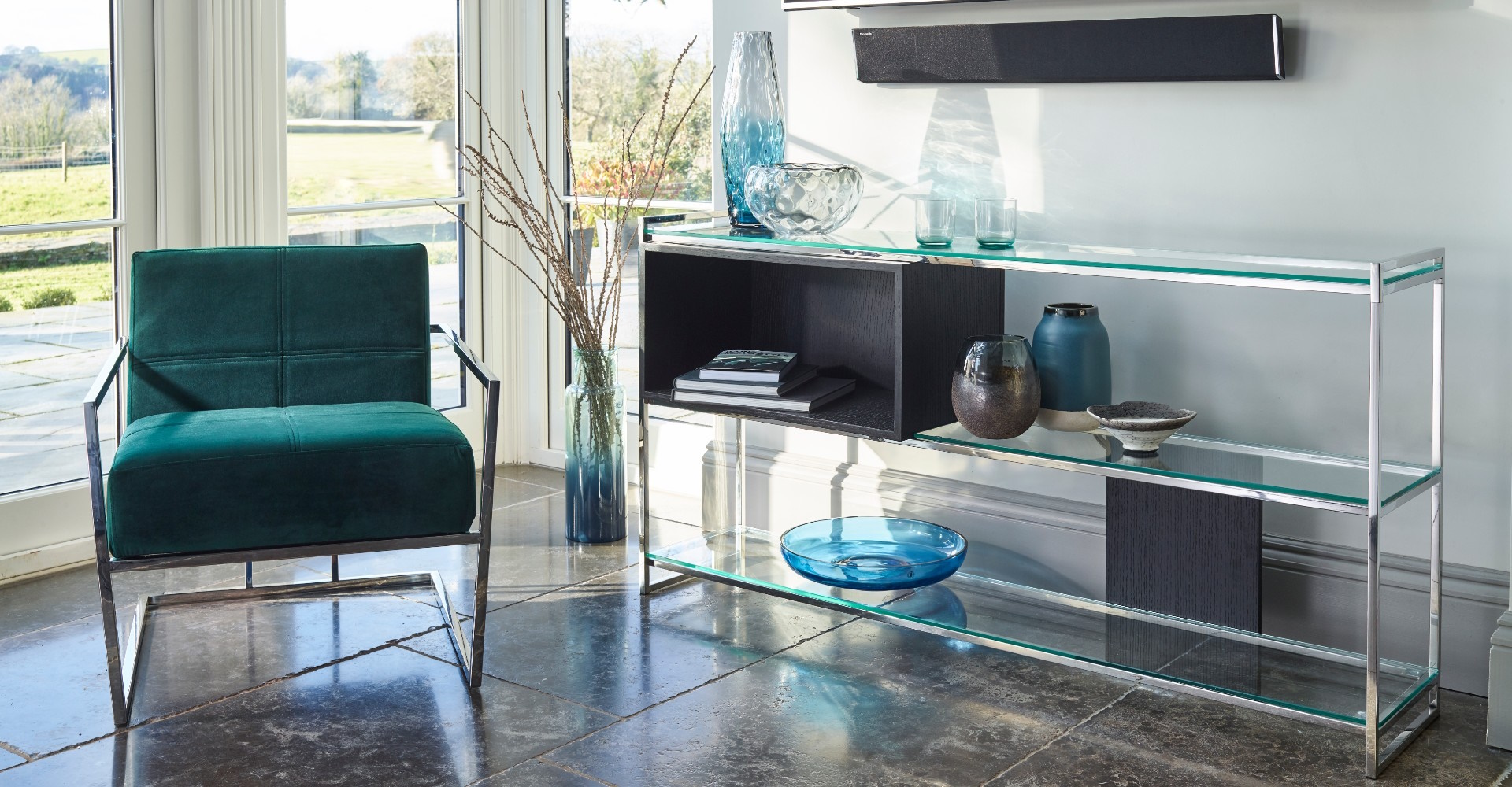 velvet-chair-and-glass-side-table