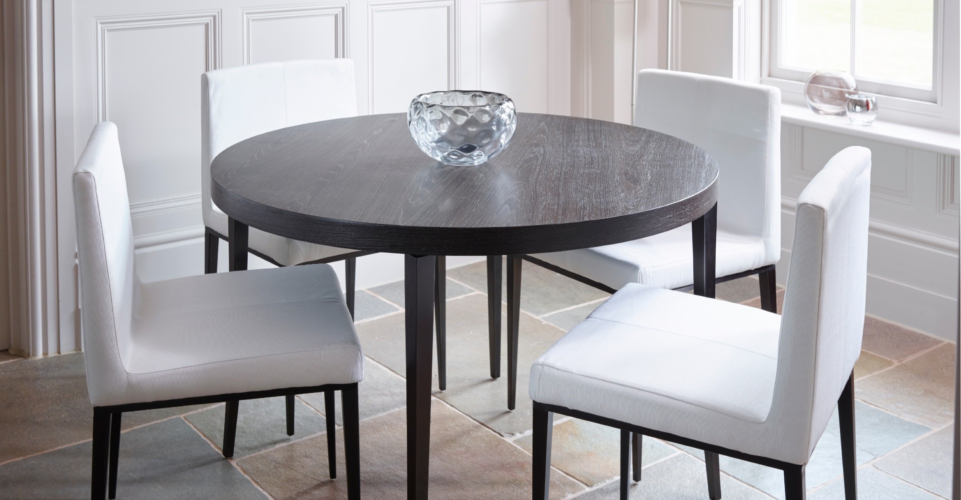 Fitzroy Round Dining Table & Off-White Upholstered Chairs by Gillmore © GillmoreSPACE Ltd