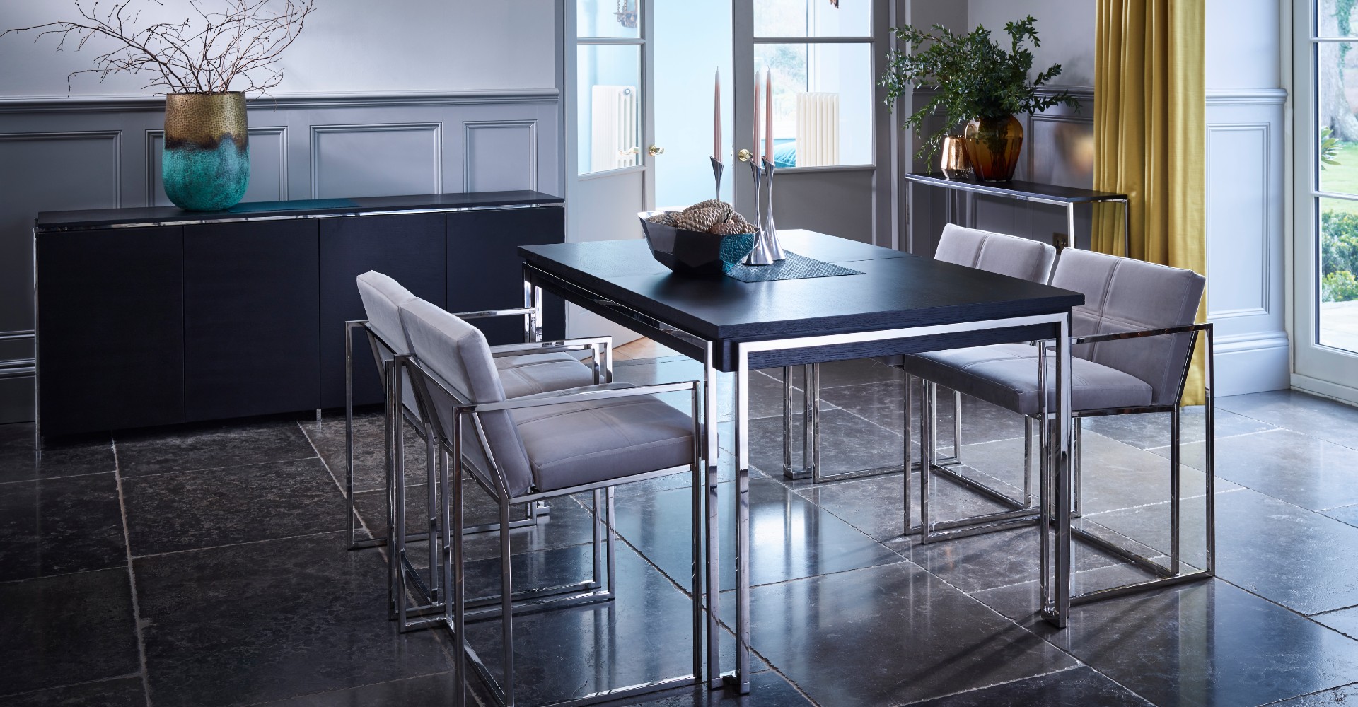Federico Dining Table And Chrome Dining Chairs by Gillmore © GillmoreSPACE Ltd